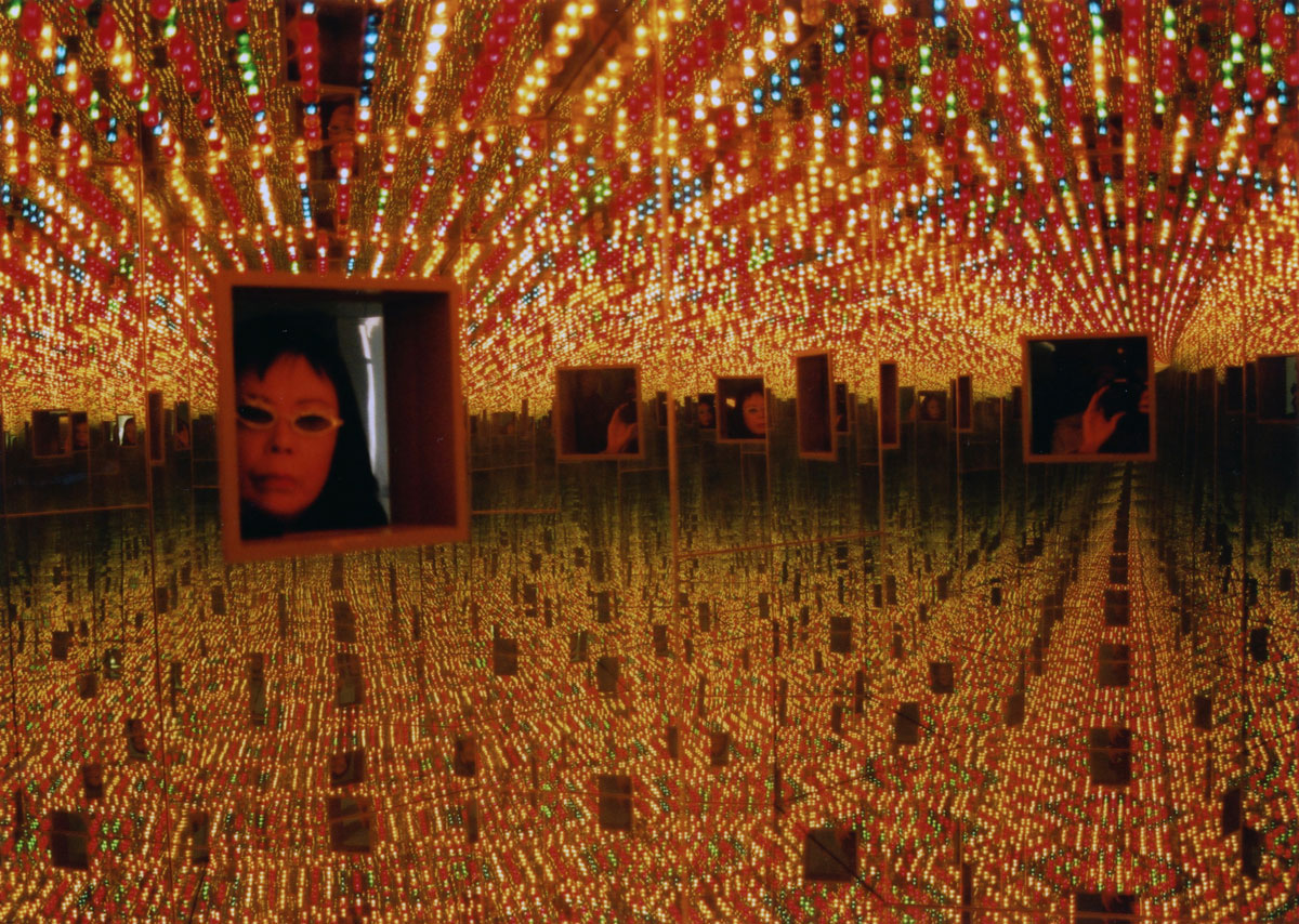 Yayoi Kusama Installation view of Infinity Mirrored Room—Love Forever, 1994, in My Solitary Way to Death, Fuji Television Gallery, 1994. Wood, mirrors, metal, and lightbulbs. Collection of Ota Fine Arts © Yayoi Kusama